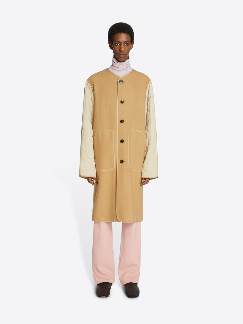 Unlined collarless coat