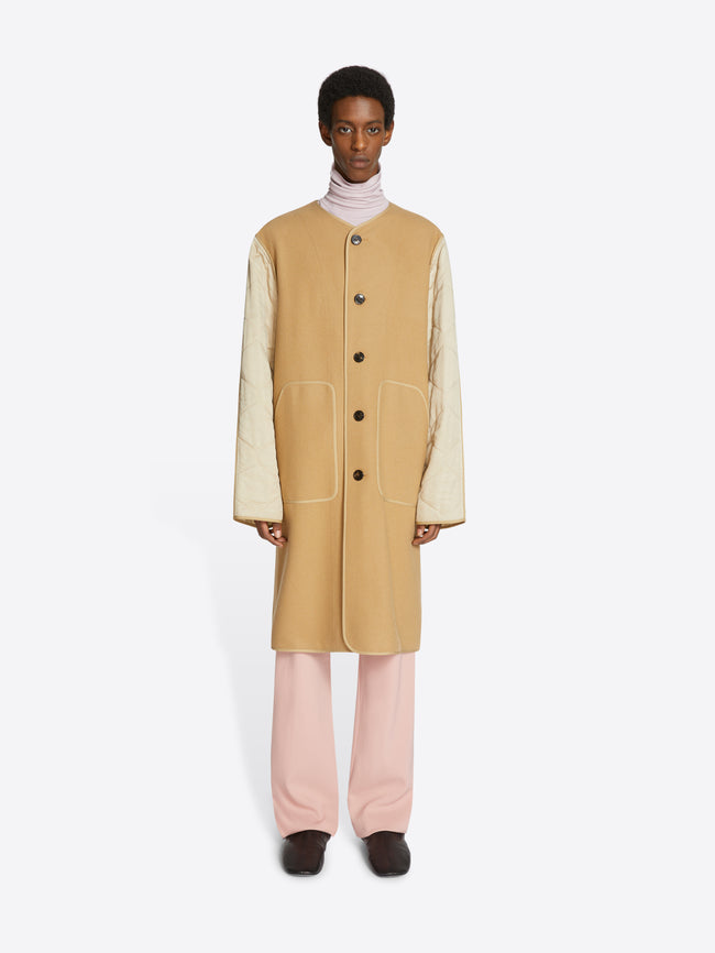 Unlined collarless coat