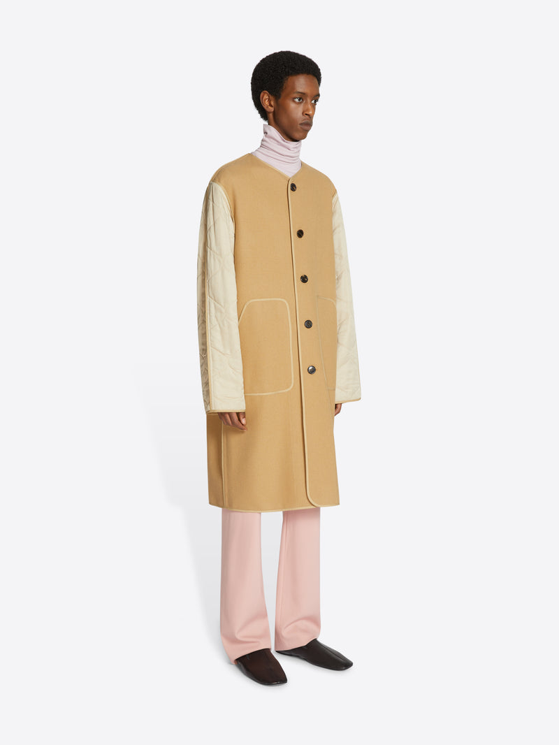 Unlined collarless coat